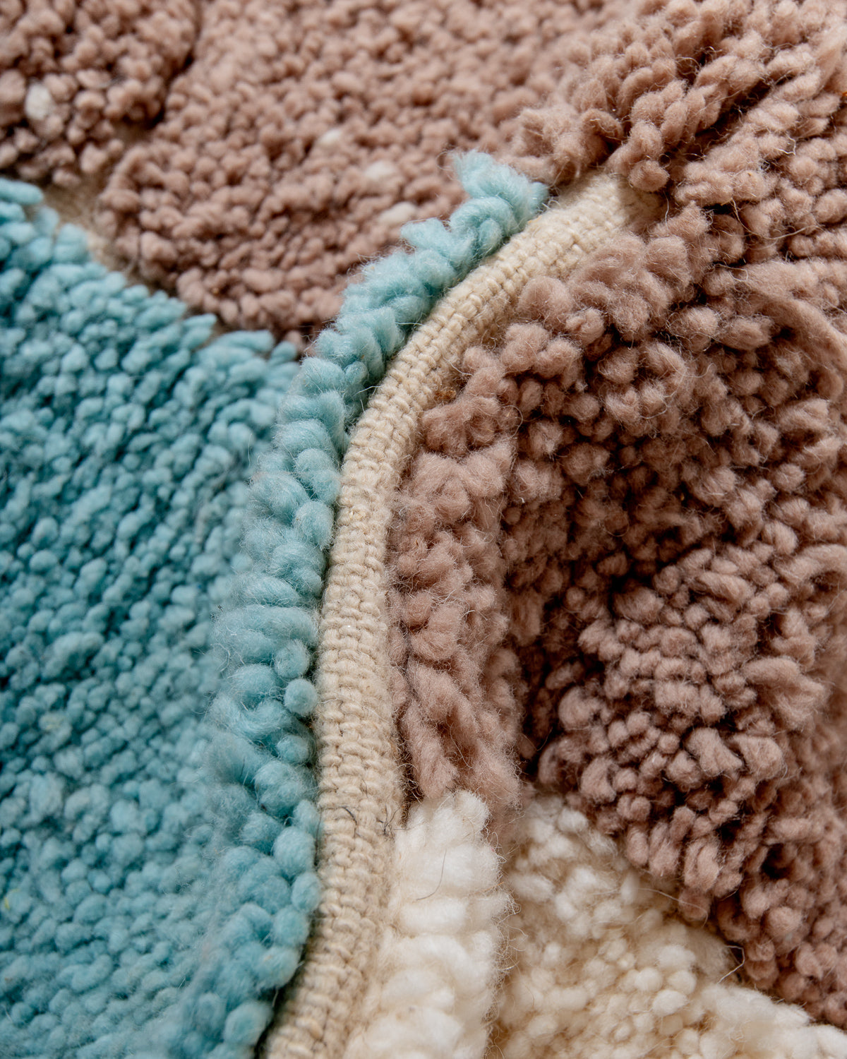 Modern, designer, handcrafted Berber rug from Morocco. Beniourain carpet with beautiful colours and patterns and fluffy wool texture.